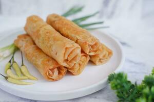 Lumpia or lunpia, traditional snacks from Semarang, Central Java, Indonesia. Traditional spring roll photo