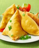 AI Generated Delicious Chicken Samosa with Green Chilli Sos and Dry Chilli Sos free photo