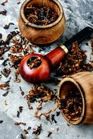 Vintage wooden tobacco pipe photo