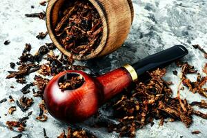 Vintage wooden tobacco pipe photo