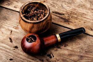 Smoking pipe and tobacco photo