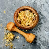 Dried calendula flowers photo