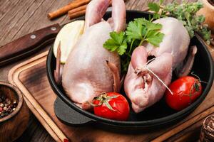 Raw meat quails photo