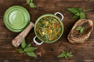 Seasonal fresh nettle soup. photo