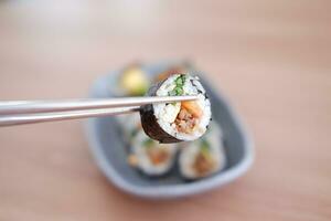 Sushi roll japanese food style on wooden table background. photo