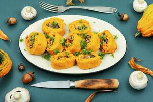 Pumpkin rolls, pie with mushrooms photo