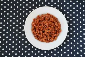 Orek tempe or Sauteed Tempeh is a typical Indonesian cuisine with herbs, garlic, onion, chilli and soy sauce. It tastes delicious photo