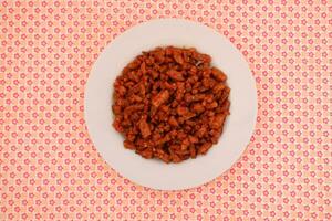 Orek tempe or Sauteed Tempeh is a typical Indonesian cuisine with herbs, garlic, onion, chilli and soy sauce. It tastes delicious photo