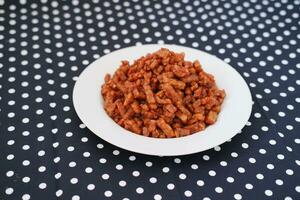 Orek tempe or Sauteed Tempeh is a typical Indonesian cuisine with herbs, garlic, onion, chilli and soy sauce. It tastes delicious photo