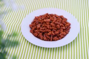 Orek tempe or Sauteed Tempeh is a typical Indonesian cuisine with herbs, garlic, onion, chilli and soy sauce. It tastes delicious photo