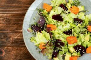 Autumn salad with pumpkin and beets. photo