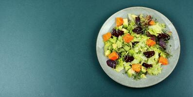 Salad with pumpkin and beets, space for text. photo