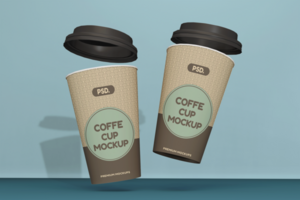 Coffee cups in gravity mockup psd