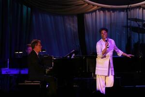 David Foster accompanies as Dionne Warwick performs Fight Night XIV JW Marriott Resort Phoenix AZ April 52008 photo