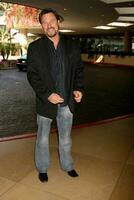 Greg Evigan arriving at the Hallmark Channel Presentation at the TV Critics Tour at the Beverly Hilton Hotel in Beverly Hills CA on July 8 2008 photo