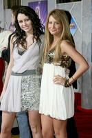Miley Cyrus  Ashley Tisdale Hannah Montana  Miley Cyrus Best of Both Worlds Concert Movie Premiere El Capitan Theater Los Angeles CA January 17 2008 photo