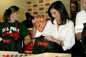 Teri Hatcher Helps out at the Los Angeles Food Bank December 12 2007 Los Angeles CA 2007 photo