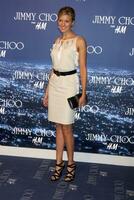 Maggie Grace arriving at the Jimmy Choo for HM Launch Party Private Residence West Hollywood CA November 2 2009 photo