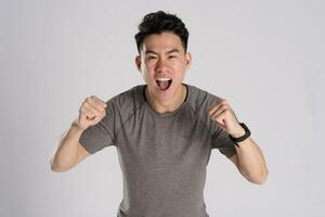 Image of Asian man exercising on white background photo