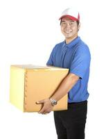 delivery man toothy smiling face and holding paper box container isolated white background photo