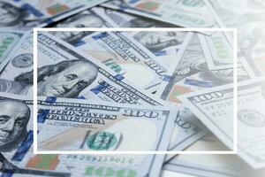 100 dollar US banknotes placed on a white background.backdrop,wallpaper,white line. photo