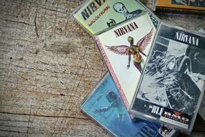America, Washington State  September 08 2023  Nirvana cassette tape on wooden floor, Nirvana band, Kurt Cobain, Nirvana songs, In Uthro photo