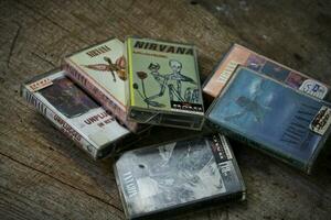 America, Washington State - September 08 2023  Nirvana cassette tape on wooden floor, Nirvana band, Kurt Cobain, Nirvana songs, In Uthro photo