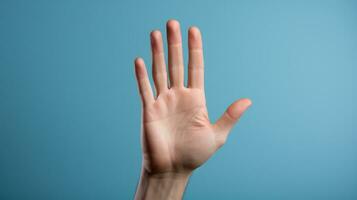 Close up of female hand gesturing with fingers on blue background. Generative AI photo