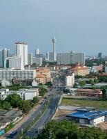 Scenery of Tower with buildings with blue sky near the coastline photo