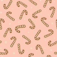 Pink Christmas sweet background with hand drawn candy canes. Tasty winter holiday seamless pattern in vector. Cute baked gingerbread cookies, snowflakes repeat background, wallpaper, wrap paper, print vector