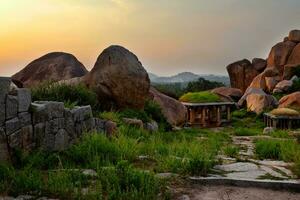 Ancient ruins of Hampi on sunset. India photo