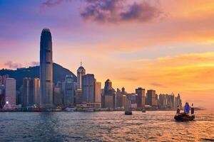 Junk boat in Hong Kong Victoria Harbour photo