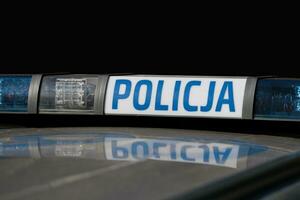 Poland, Leszno September 16, 2023 Close-Up of Polish Police Sign on Patrol Car. photo