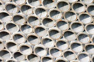 a close up of a wall of metal pipes photo
