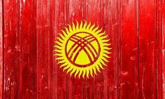 Flag of Kyrgyz Republic on a textured background. Concept collage. photo