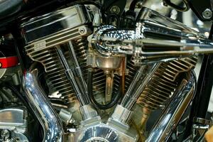 Closeup and crop engine of Chopper motorbike with chrome colors photo