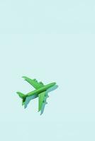 Sustainable aviation concept - green plane. photo