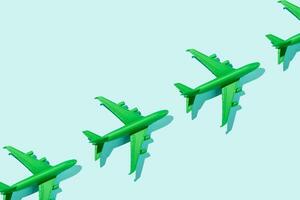 Sustainable aviation concept - green plane. photo