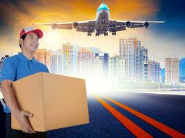 delivery man and cargo plane flying over urban skyline for delivering and logistic business photo