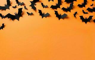 Halloween decorations, bats on vibrant orange background. Happy holiday concept. Party greeting card mockup with copy space at the bottom. Flat lay, overhead, top view. AI Generative photo