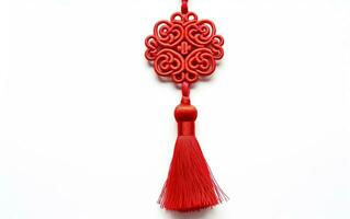 Chinese symmetrical ornament, a knot with brush fringe isolated on white background. Symbol of good luck. AI Generative photo