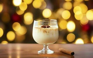Christmas drink poster. Homemade eggnog in a brandy snifter glass on a wooden table with cinnamon. Golden light, bokeh, de focus. AI Generative photo