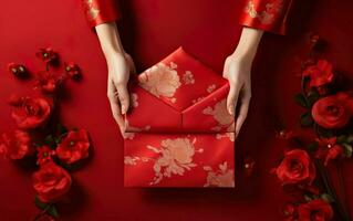 Chinese new year poster. Hands in red clothes holding a traditional wrapped gift box, top view, seen from above, AI Generative photo