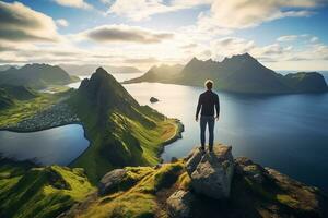 Man standing on the top of a mountain and enjoying the view AI generated photo