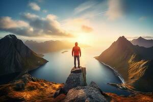 Man standing on the top of a mountain and enjoying the view AI generated photo