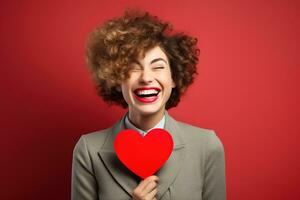 Portrait of a happy woman with red heart on a red background.Valentine's Day Concept AI generated photo