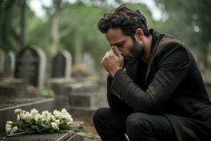 Portrait of a sad and depressed man in a black coat on the background of a cemetery.Funeral Concept AI generated photo