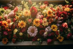 Colorful flowers on the grave in the cemetery, funeral concept. AI generated photo