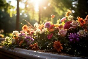 Colorful flowers on the grave in the cemetery, funeral concept. AI generated photo