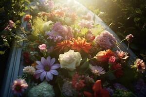 Colorful flowers on the grave in the cemetery, funeral concept. AI generated photo